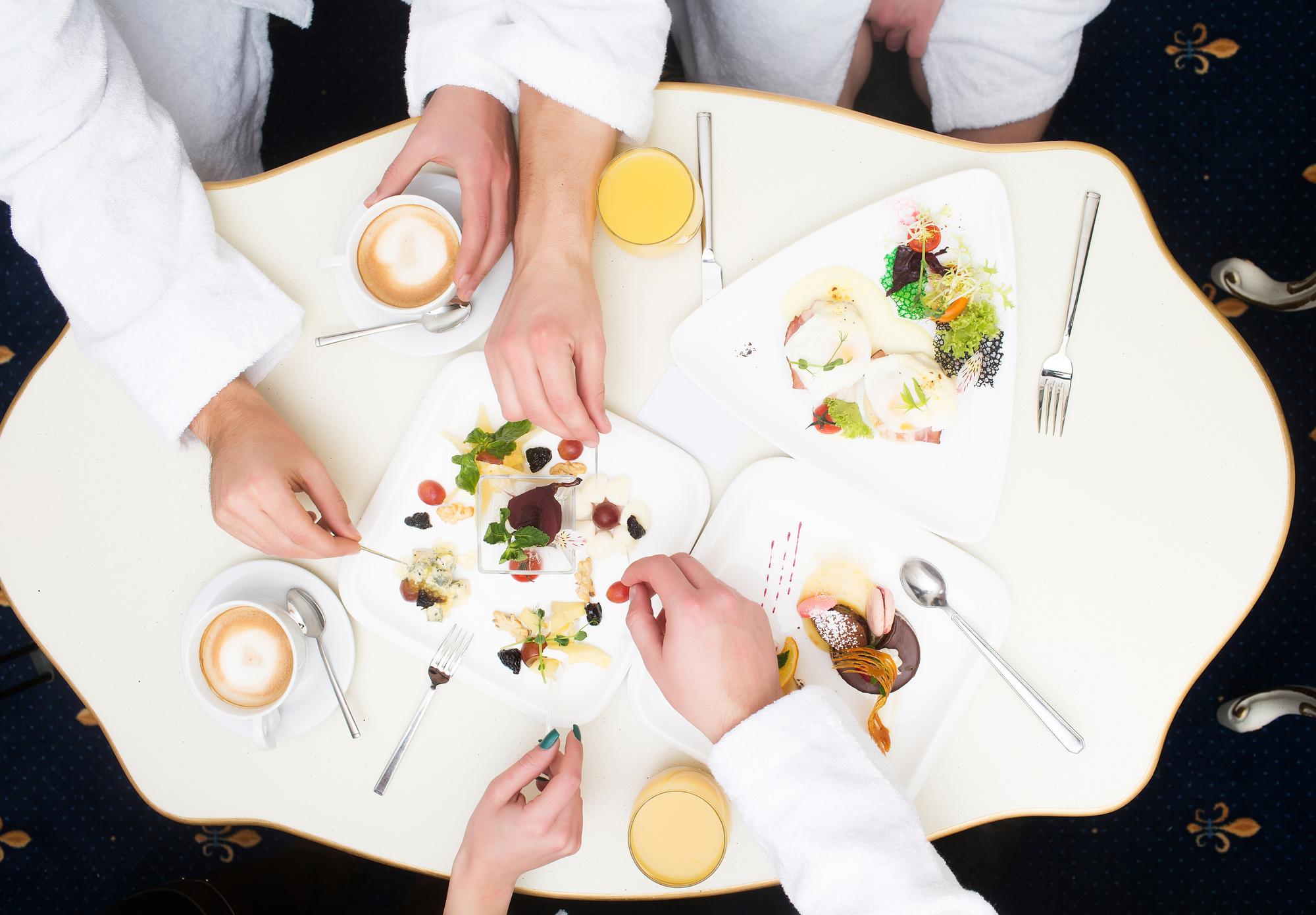 Participants plating dishes together
